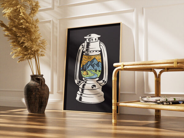 A vintage white camping lantern contains a colorful scene: blue mountains, a yellow sky with sun, a green valley with a river, tent, trees, and a bear