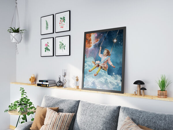 A young girl in a pink dress and yellow socks swings joyfully above white clouds in a cosmic sky with stars and a nebula.
