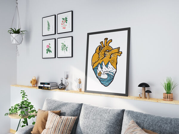 Stylized anatomical heart containing a landscape with white mountains, blue ocean waves, a sailing ship, and a sun.