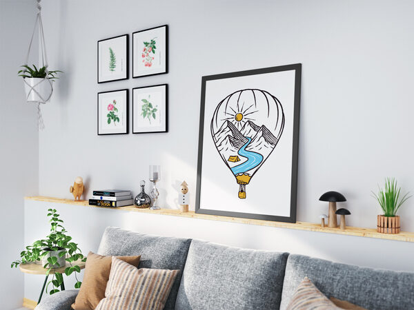 Sıcak hava balonunun, dağlar, güneş, kıvrımlı nehir, bir çadır ve balon sepetinde bir kişiyle birlikte bir manzarayı çerçevelediği çizgi resim çalışması.