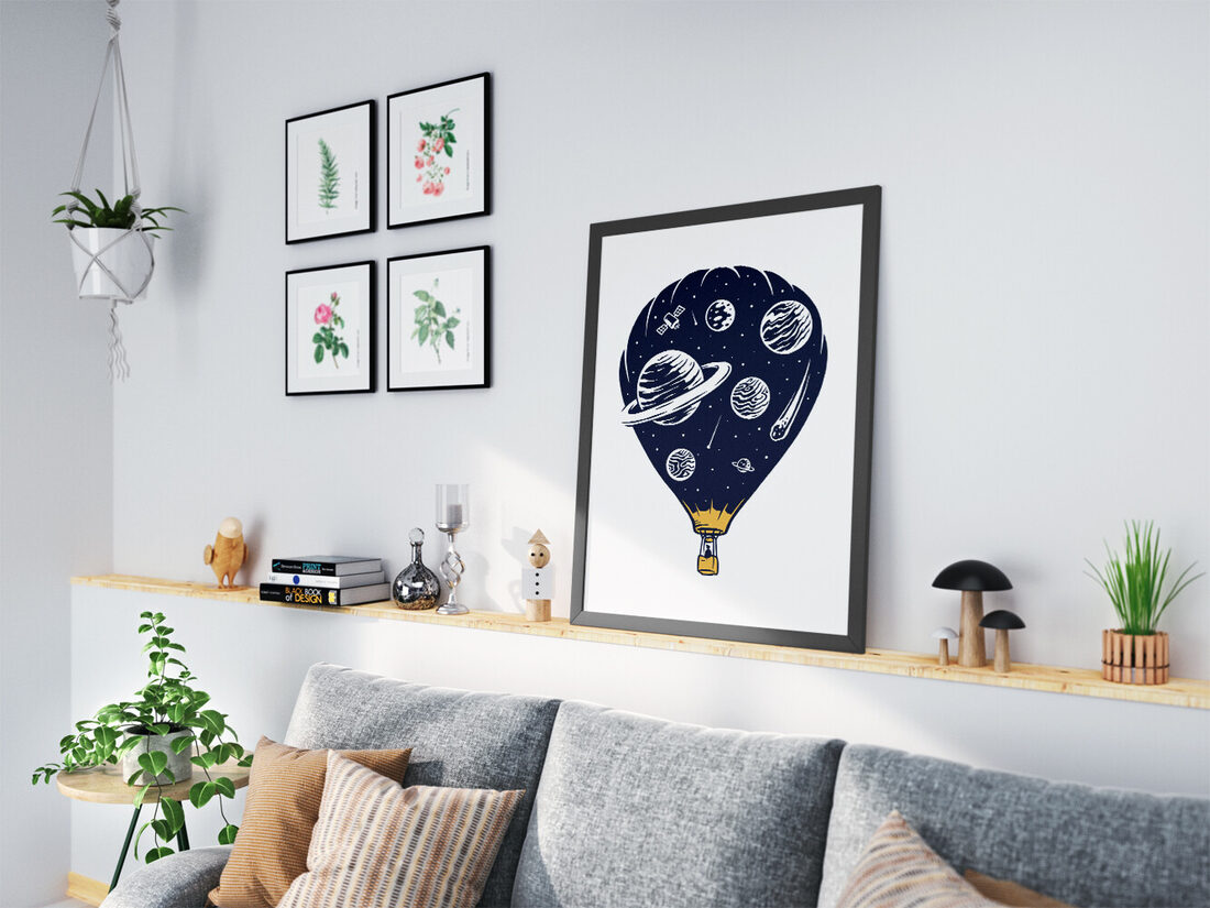 A whimsical vector illustration of a hot air balloon with a dark blue balloon part containing planets, a satellite, and stars, with a golden basket an